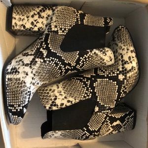 Snakeskin high heels/boots